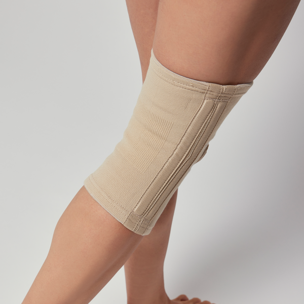 Напівжорсткий наколінник із бічними пластиковими вставками Orliman TN – 211S