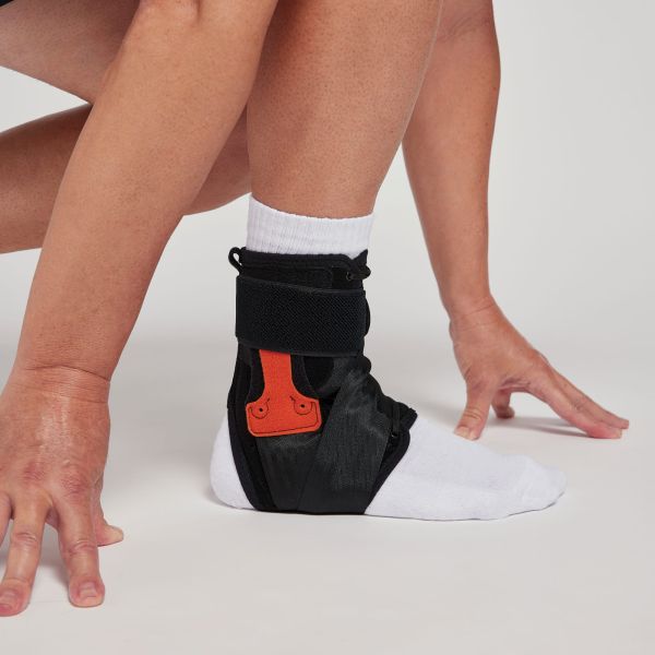 Напівжорсткий ортез гомілковостопного суглоба Orliman Tobiplus EST-090