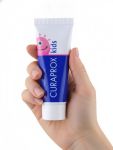 Дитяча зубна паста Curaprox зі смаком кавуна. З фтором 1450ppm. . Об’єм - 10мл. Для дітей віком від 6-ти років.